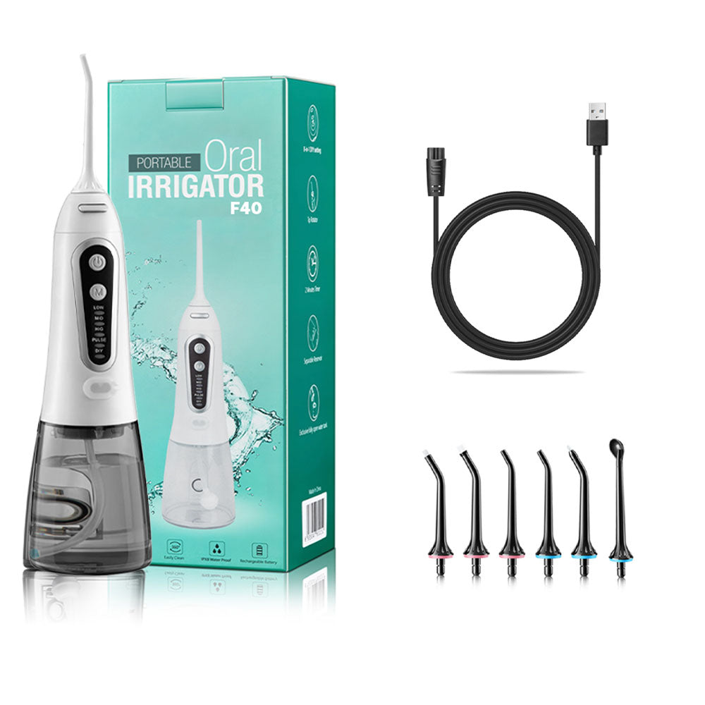 Irrigateur buccal Oral Irrigator F40 Blanc - 6 buses incluses - un câble USB de recharge - monjetdentaire.fr